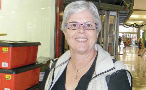 Margaret Ware, from Sydney, shops for Christmas trim. Margaret Ware, from Sydney, shops for Christmas trim.